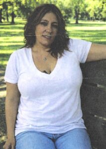 Angelina Omara in jeans and t-shirt