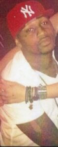 Death Row Inmate Ammar Harris in red hat