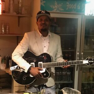 Ahmed Osman Farah with Guitar