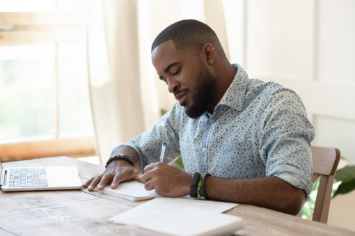 straight man writing letter to male prison pen pal