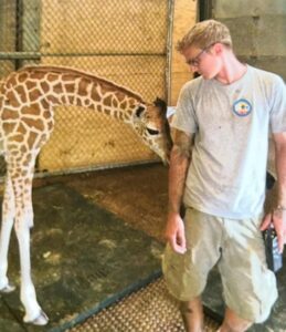 matt reynolds with giraffe